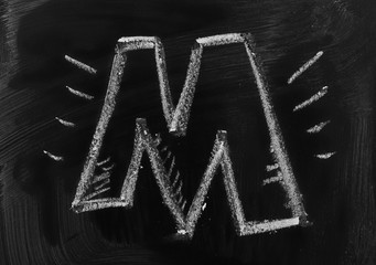 Letter M drawn on black chalkboard, blackboard texture and background