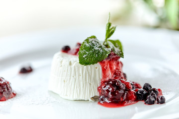 dairy dessert with fresh berries