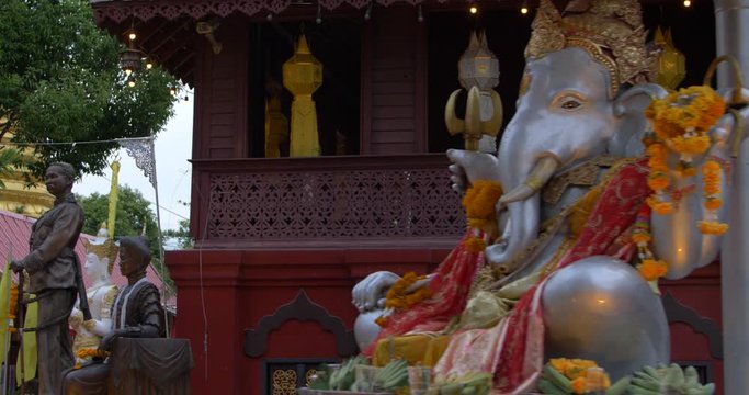 Tilt view of Elephant statue and panning outside buddhist temple Wat Sri Suphan, Chiang Mai