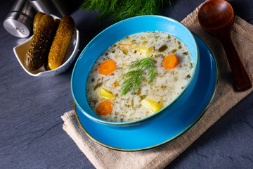Polish sour cucumber soup or salt cucumber soup.