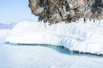 Rock cliff with ice in Lake Baikal, Russia, landscape photography