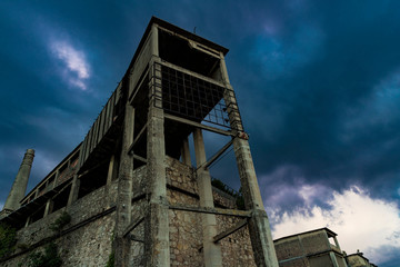 Fototapeta na wymiar Urban exploration in an abandoned cement factory