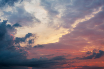 Fototapeta na wymiar Beautiful sky at sunrise with thunderclouds before the rain