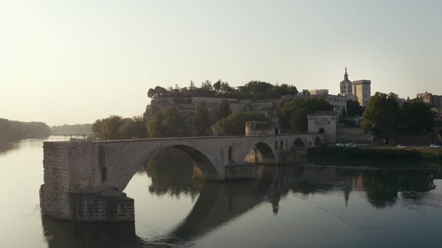 Aerial view in Avignon France during the sunrise with the Papal Palace (Palais des Papes) and the Avignon Bridge, Pont d'Avignon or Pont St-B&eacute;n&eacute;zet
