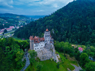 Fototapeta na wymiar Aerial panorama view of the medieval Bran Castle, known for the myth of Dracula , Dracula Castle in Brasov, Transylvania. Romania.