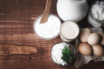 Healthy food high in protein. milk eggs cheese sour cream