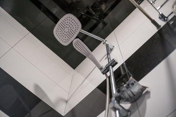 Close up rains in the bathroom, modern interior. Black and White Bathroom