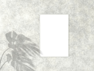 2x3 vertical White frame for photo or picture mockup on concrete background with shadow of monstera leaves. 3D rendering.
