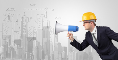 Young supervisor architect yelling to a big city panorama