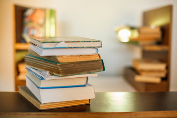 Education concept. Stack of books on table.