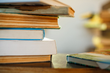 Education concept. Stack of books on table.