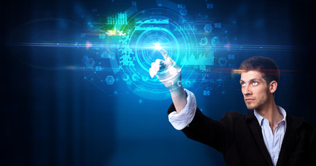 Man touching hologram screen displaying medical symbols and charts