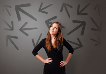 Business person choosing between two directions