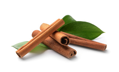 Aromatic cinnamon sticks on white background