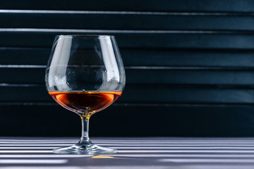 glass of cognac copy space