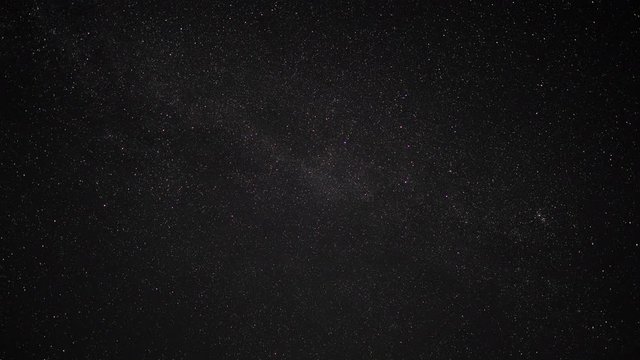 Stars Turning Around in a Dark Sky (time lapse/zoom in)