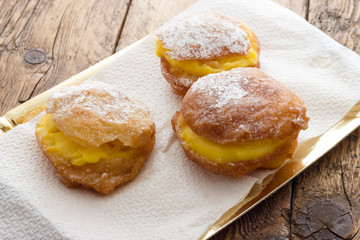 Handmade krapfen filled with pastry cream