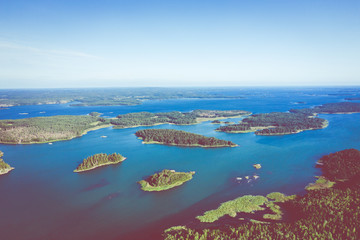 Naklejka na ściany i meble Aerial view of Aland Islands at summer time. Finland. The Archipelago. Photo made by drone from above. Nordic Natural Landscape.