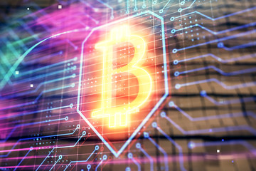 Bitcoin sign hologram with abstract background. Multi exposure. Blockchain concept.