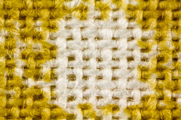 close up of yellow and white mesh fabric
