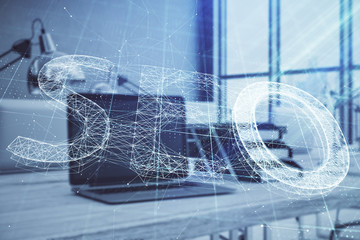 SEO sketch hologram with desktop office background. Double exposure. Concept of search optimization