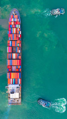 Container ship working at industrial port, Business import and export logistic and transportation...