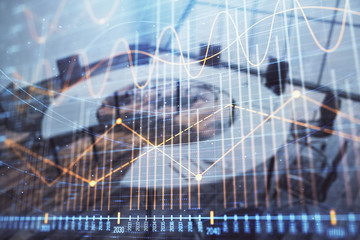 Double exposure of forex chart on conference room background. Concept of stock market analysis