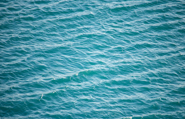Surface of the ocean and sea. Blue water.