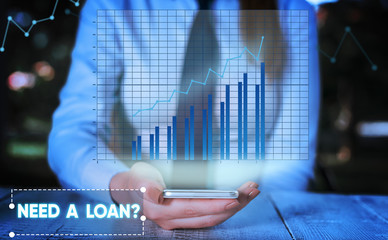Conceptual hand writing showing Need A Loan question. Concept meaning amount of money that is...