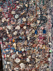 Chewing gums stuck at the entrance of the house of Romeo and Juliet in Verona