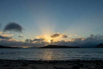 Islands and Sea with Sunset in the Background