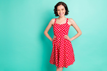 Photo of brightly smiling cute nice fascinating girlfriend wearing vivid red dress while isolated...