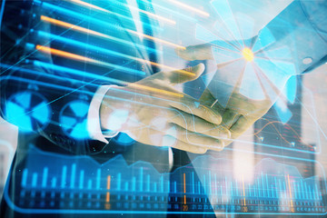 Fototapeta premium Double exposure of business theme drawing on cityscape background with handshake. Concept of partnership