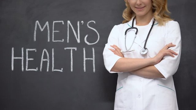 Urologist standing near Mens health words, medical exam to prevent prostatitis
