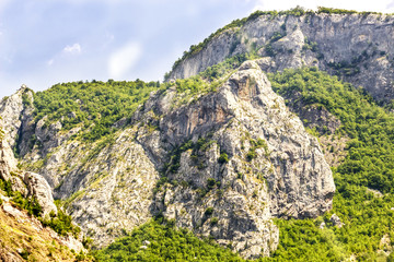 Beautiful mountain landscape on sunny summer day. Montenegro, Albania, Dinaric Alps Balkan Peninsula. Сan be used for postcards, banners, posters, posters, flyers, cards