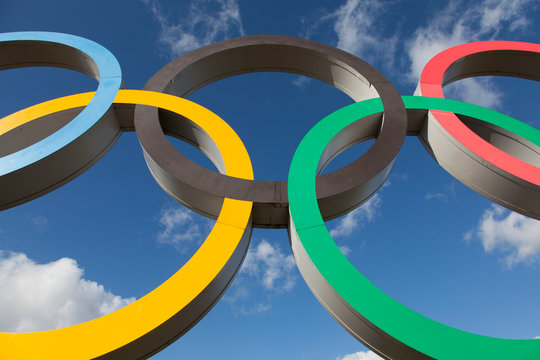 LONDON, UK - February 15th 2018: The Olympic symbol, made up of five interconnected coloured rings, under a blue sky