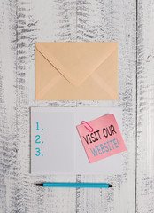 Writing note showing Visit Our Website. Business concept for visitor who arrives at web site and...