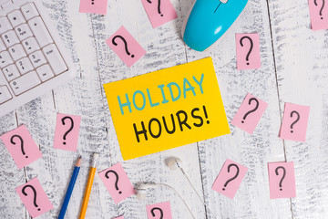 Writing note showing Holiday Hours. Business concept for Overtime work on for employees under...