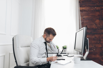 Fototapeta na wymiar Office worker with pain from sitting at desk all day