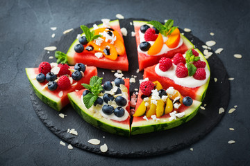 Watermelon pizza with berries, fruits, yogurt, feta cheese
