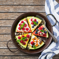 Watermelon pizza with berries, fruits, yogurt, feta cheese