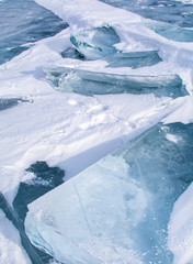 Fototapeta na wymiar Ice sheets in frozen lake at Lake Baikal, Russia
