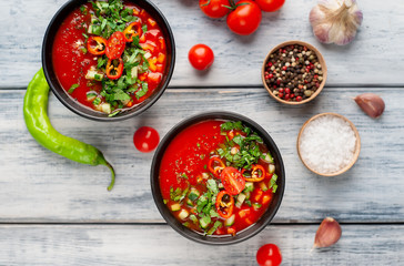 Traditional spanish cold tomato soup gazpacho on wood background