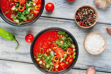 Traditional spanish cold tomato soup gazpacho on wood background