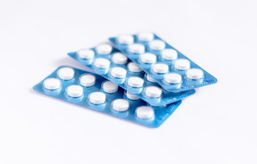 pills inside of blue tablet isolated