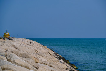 Aerial view lighthouse Punta Sabbioni Leuchtturm entrance in Venice, Italy. The main lighthouse at the entrance to the city of Venice. Resorts of Venice. Tourist place.