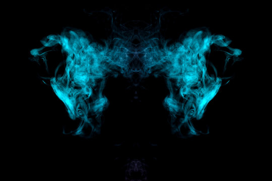 Mystical creature, a ghost in the form of clouds of smoke from green and pink on a black background. Print for clothes.