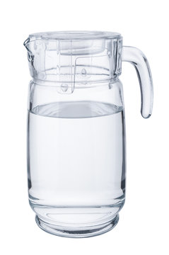 Glass decanter with pure water on white background