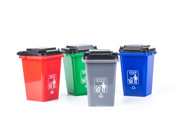 Garbage classification concept，colorful plastic garbage cans isolated on white background