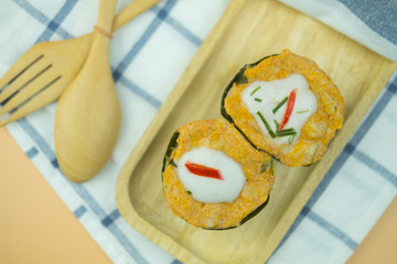 Steamed fish with curry paste in cup make from banana leaf